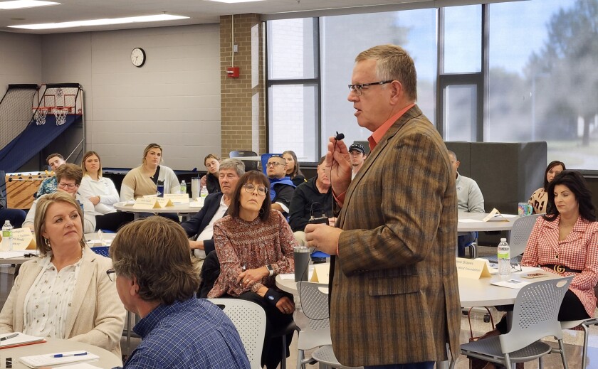Luverne Mayor Pat Baustian speaks at a listening session at the Worthington campus of Minnesota West Community and Technical College.