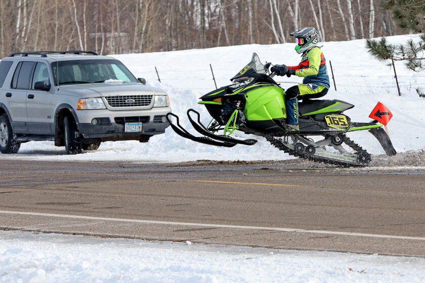 Snowmobilers race