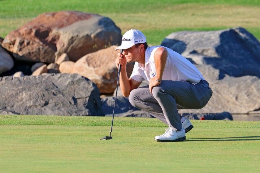 Golfer Michael Brennan eyes the green before putting on Sunday, Aug. 31, 2025, during the PGA Tour Americas CRMC Championship presented by Northern Pacific Center at Cragun's Legacy Courses.