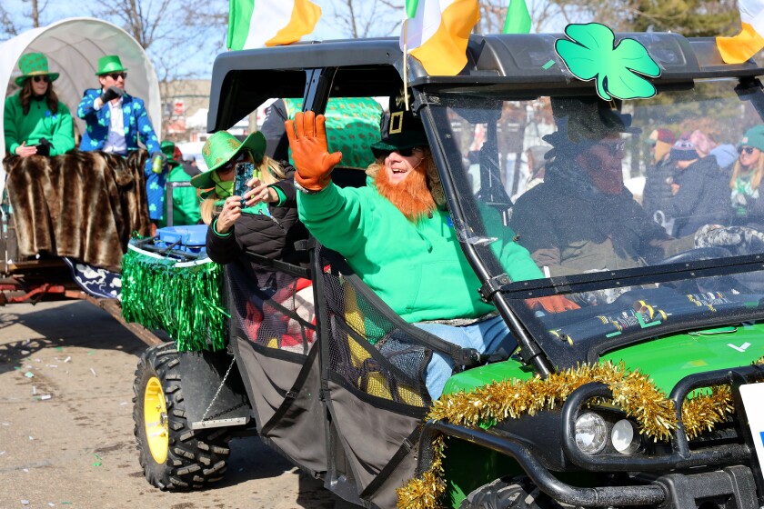 People enjoy the St. Patrick's Day parade Saturday, March 18, 2023, in Crosslake.