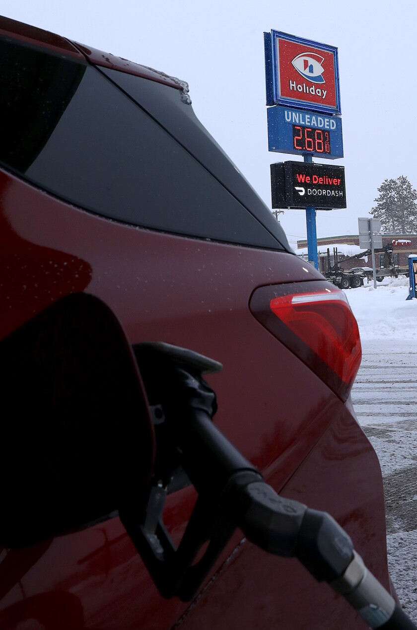The sign at the Holiday station in Scanlon shows a gallon of unleaded gas is $2.68