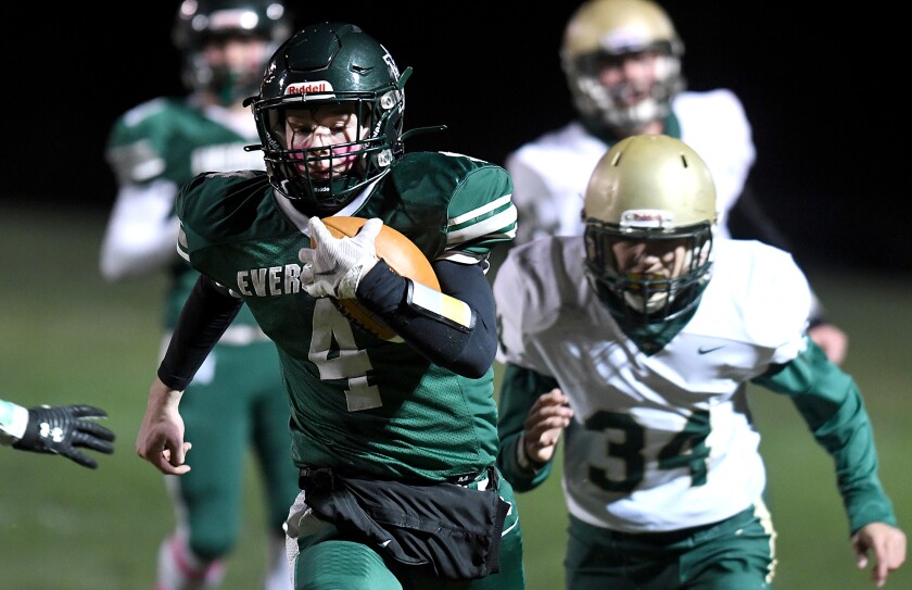 Northwood/Solon Springs’ Jared Schultz (4) breaks past the Chequamegon defense on his way to the endzone for a first quarter touchdown