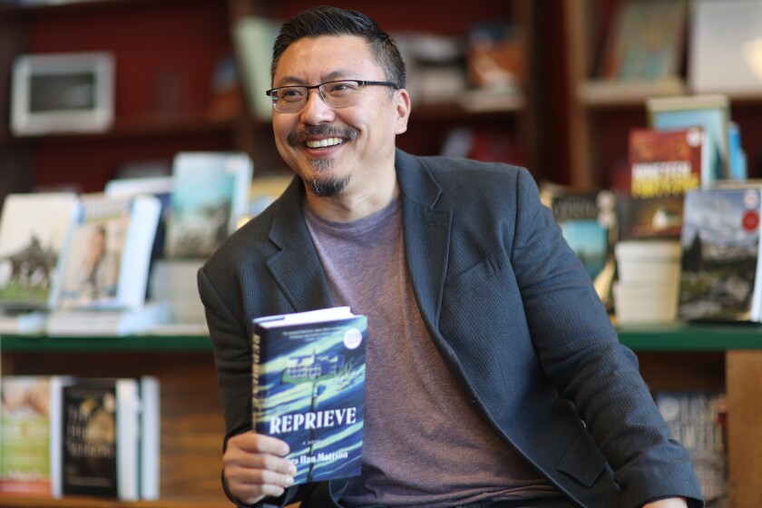 James Mattson with his book in a bookstore