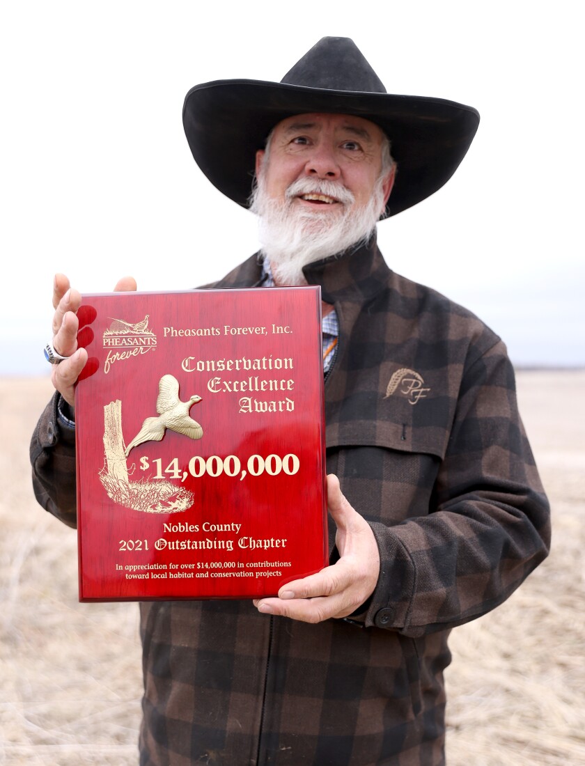 Scott Rall with Pheasants Forever Inc. Conservation Excellence Award.