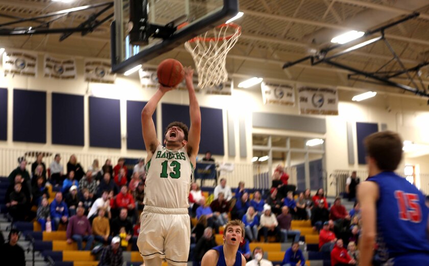 players goes up for a layup