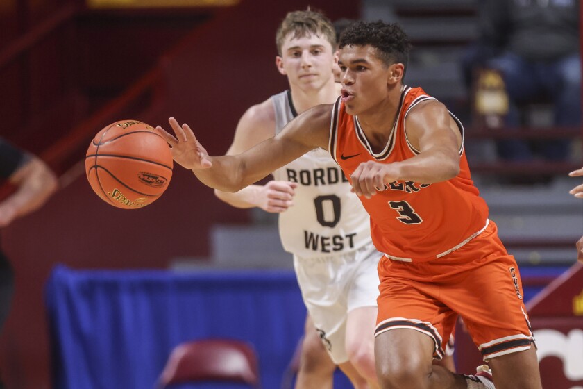 high school boys play basketball