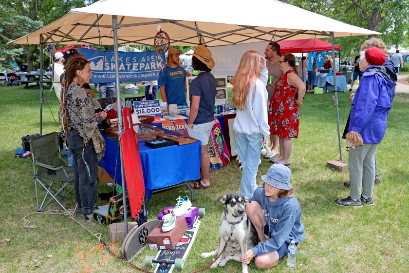 People attend Arts in the Park on Sunday, June 26, 2022, at Gregory Park in Brainerd.