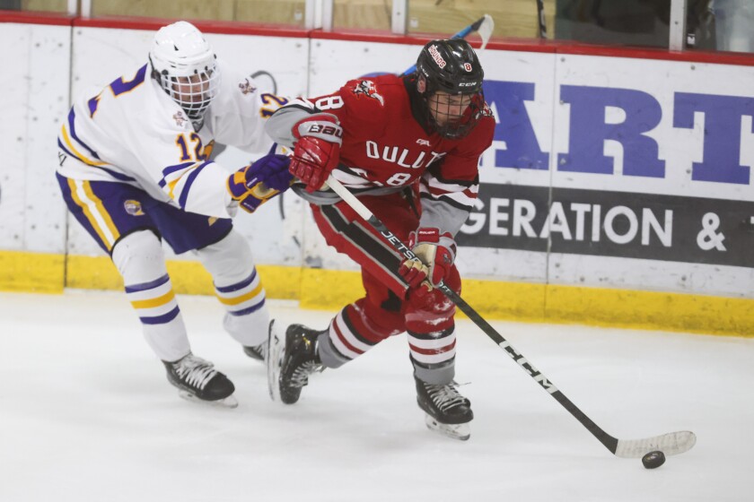 high school boys play hockey