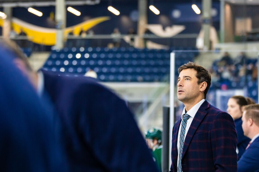 Augustana coach Garrett Raboin takes in action during a game against Bemidji State on Sunday, Dec. 7, 2025, at Midco Arena in Sioux Falls.