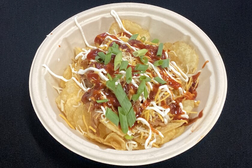 Chicken chipper served with Colby jack cheese, green onions and potato chips.