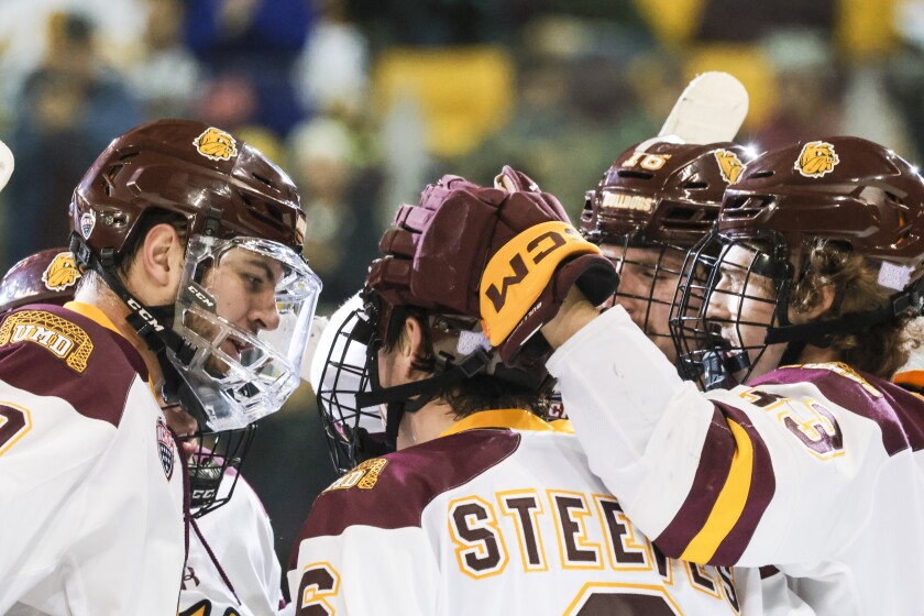 college men playing hockey
