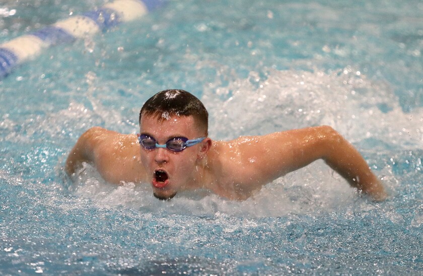 Male swimming butterfly.