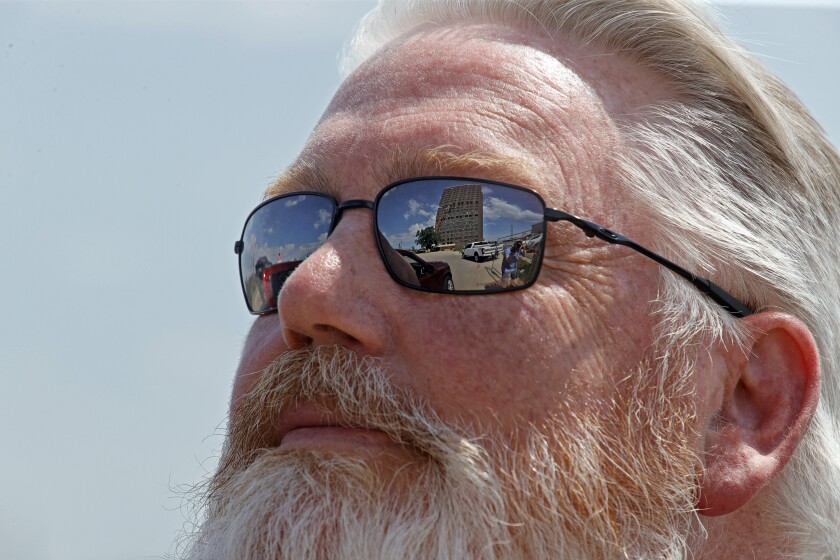 Sky peeks through Fargo high-rise as it's stripped down ahead of ...