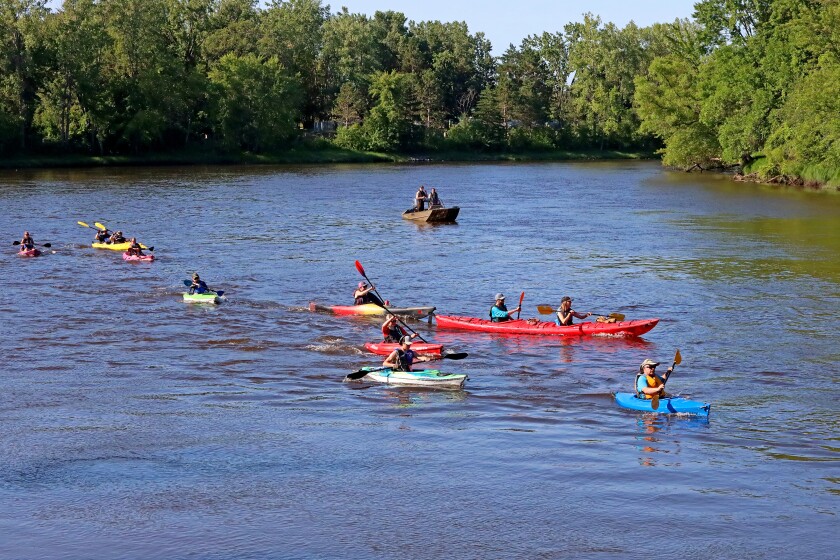 Racers head up the Mississippi River on Saturday, July 30, 2022, going from Kiwanis Park to Evergreen Landing and back again in Brainerd.