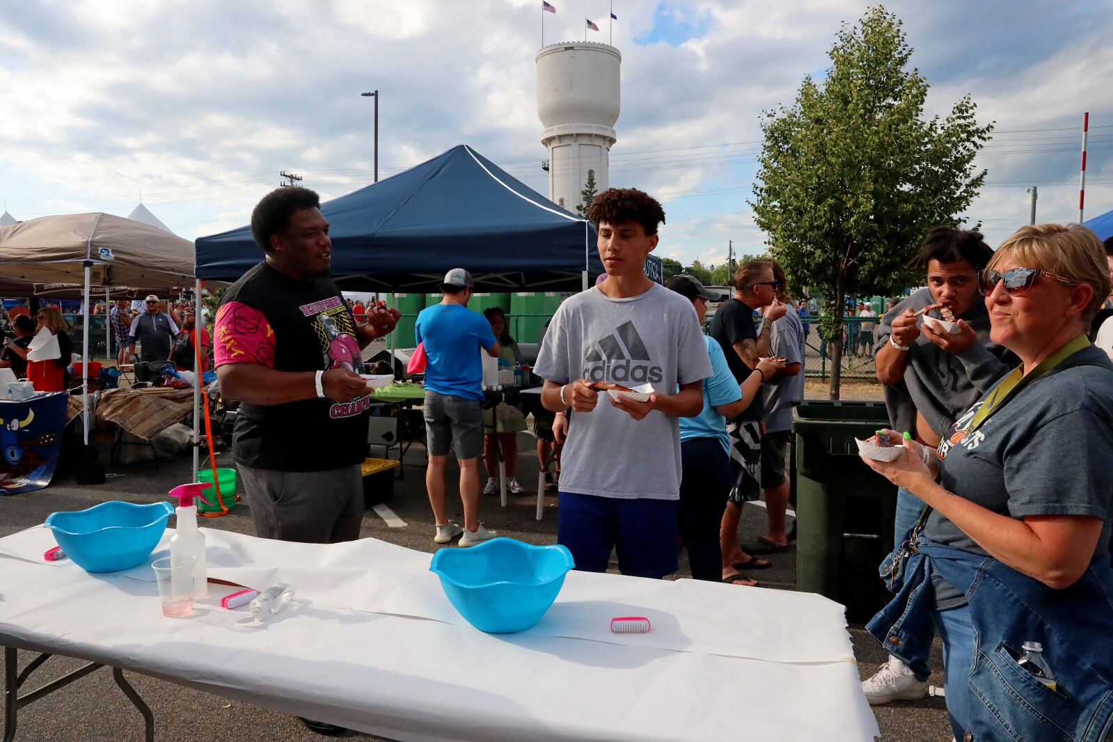 People enjoy the Cub Foods Ribfest during Brainerd Jaycees Street Fest on Saturday, July 23, 2022, in downtown Brainerd.