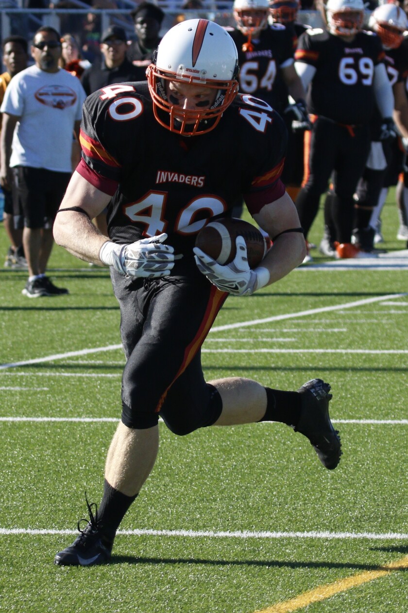 No. 85 wide receiver Jon Baune carries the ball for a first down during the game against Granite City on Saturday, June 25, 2016.Matt Hellman / The Forum
