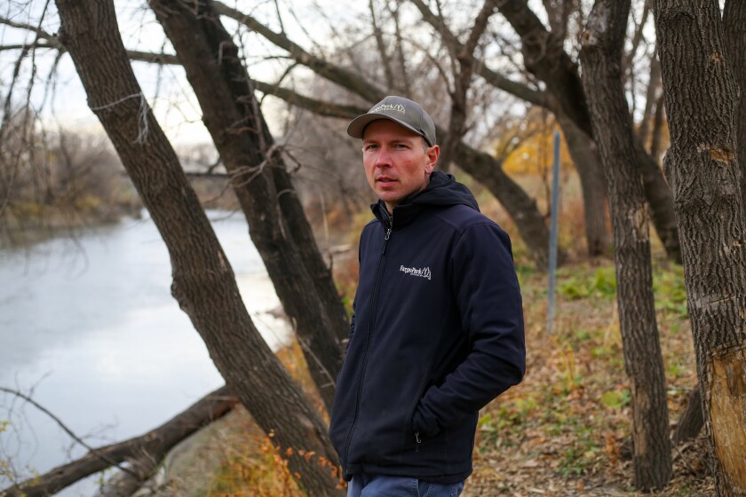 Fargo Park District Forester Sam DeMarais shows the beaver activity, like cut-down trees, on Thursday, Nov. 6, 2025, along the Red River in downtown Fargo.
