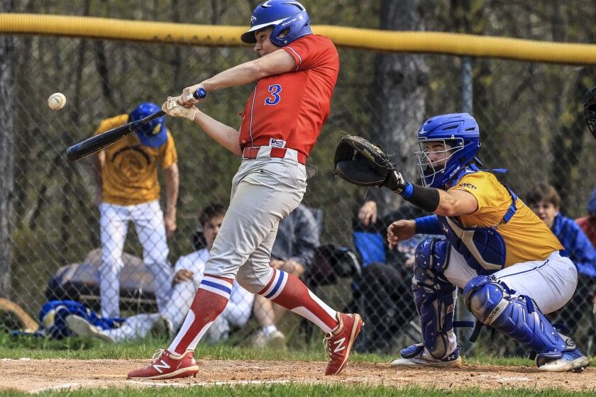 high school athletes play baseball
