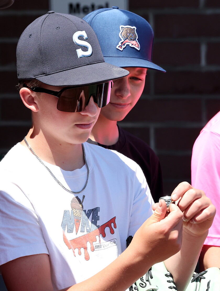 Kids look at ring.