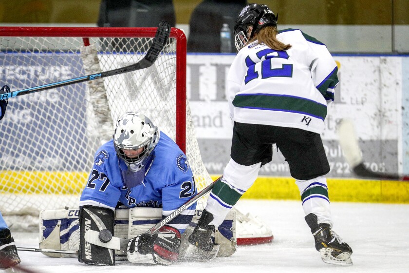 Clint Austin / caustin@duluthnews.comProctor-Hermantown's Dehli Heikes (12) shoots the puck on goal against Superior goaltender Presley Baron (27) during Tuesday's game at Hermantown Arena. The Mirage won 11-1.