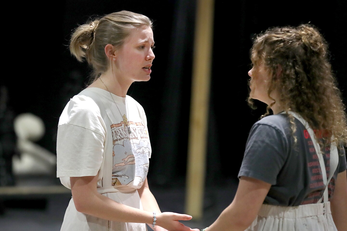 Actors perform scene.