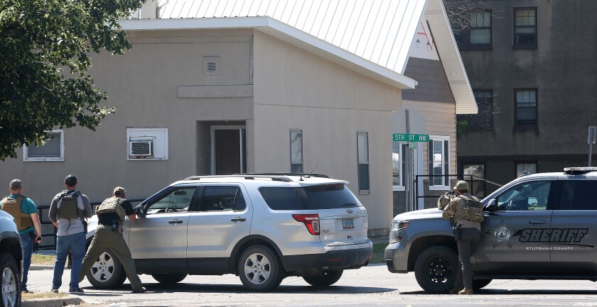 standoff law enforcement surrounding 080422.jpg