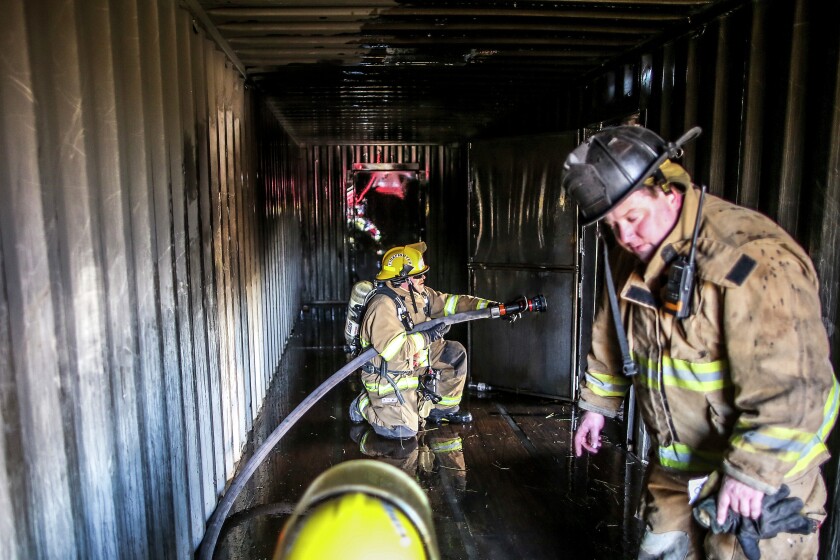 Volunteer firefighters test new burn boxes - Duluth News Tribune | News ...