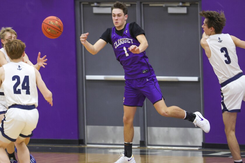 high school boys play basketball