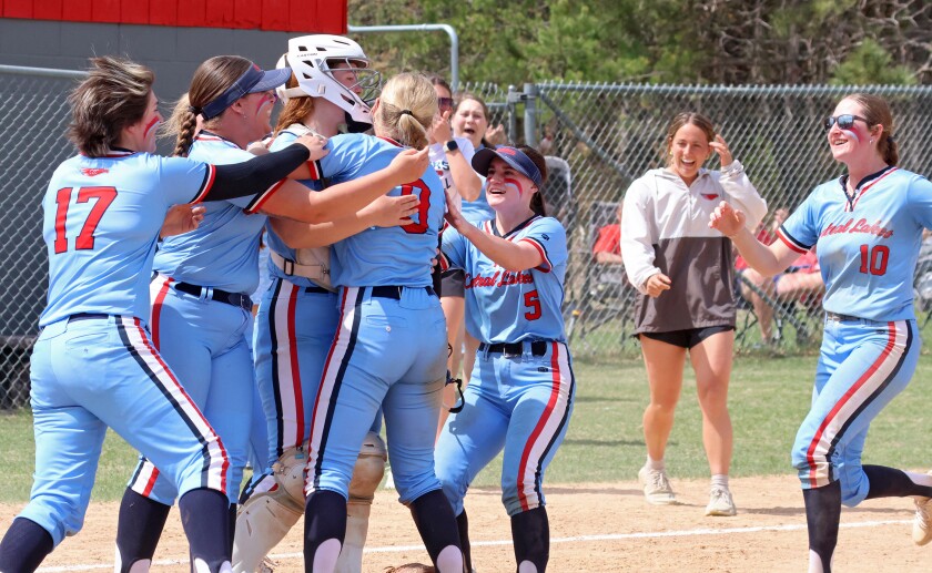 The softball team from the Central Lakes College celebrates after Beating Minnesota West on Friday, May 9, 2025, in Brainerd.