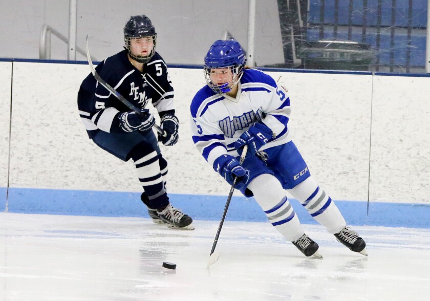 Cheyenne Abear of the Warriors handles the puck Friday, Dec. 21, against Bemidji at the Essentia Health Sports Center in Brainerd. Kelly Humphrey / Brainerd Dispatch - Gallery and Video