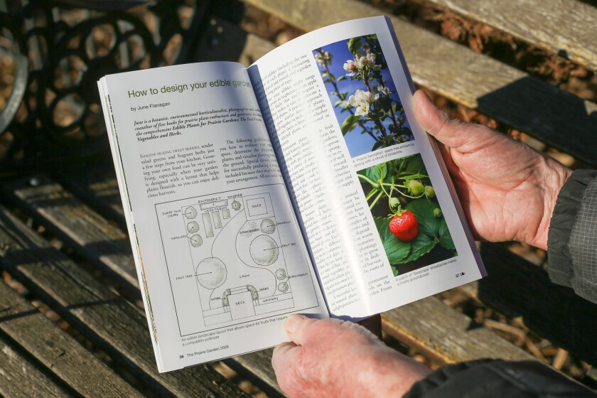 The book is filled with 52 articles making a perfect gift for any gardener. A close up of Don Kinzler holding the gardening magazine open to a page.