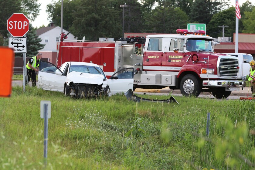 Emergency personnel respond to a multi-vehicle crash with injuries Friday near the intersection of Washington and Eighth Avenue NE in Brainerd. (Kelly Humphrey, Brainerd Dispatch - Gallery)