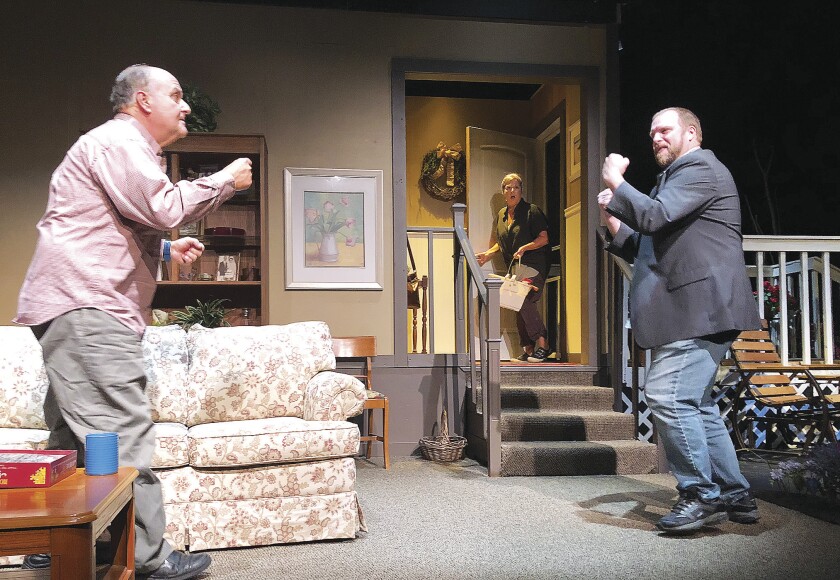 Aged boxer Sweet Clemmet Carter (played by Michael Rosen) and writer Trevor Wallace (Greg Anderson) put up their fists for a sparring session as Clemmet’s wife, Addie (Ruthie Breuer), walks in on the unexpected scene. Jana Peterson / jpeterson@pinejournal.com