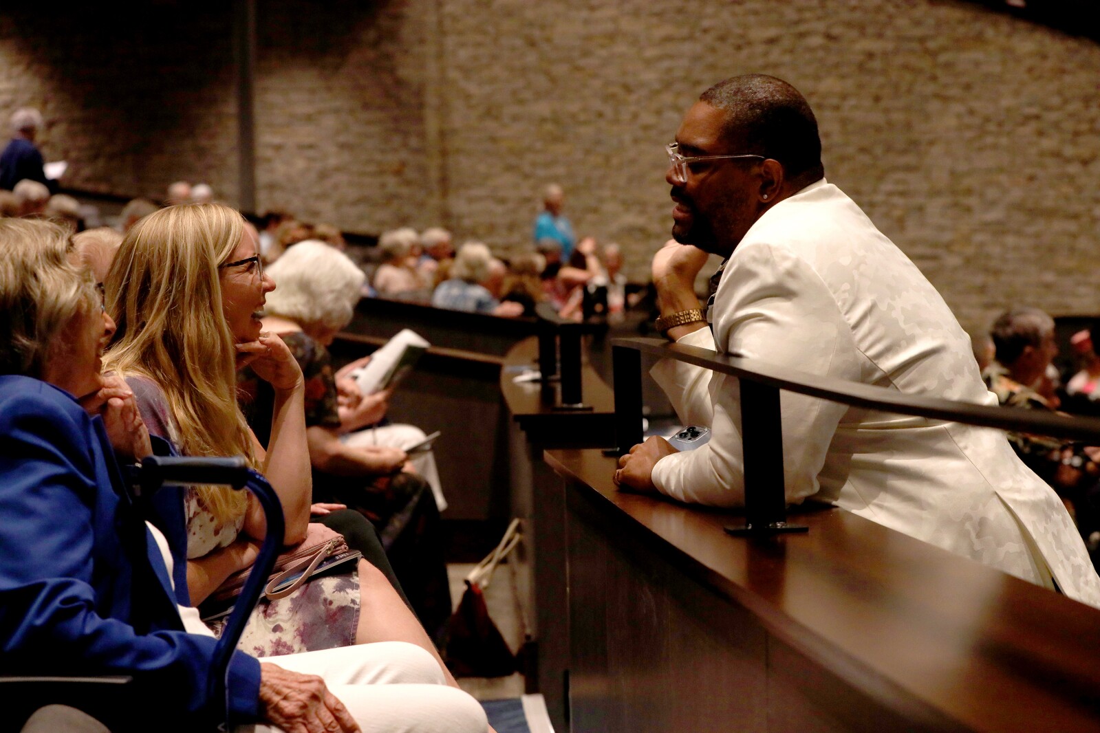 One of the actors, in character, talks to the audience before the second act.