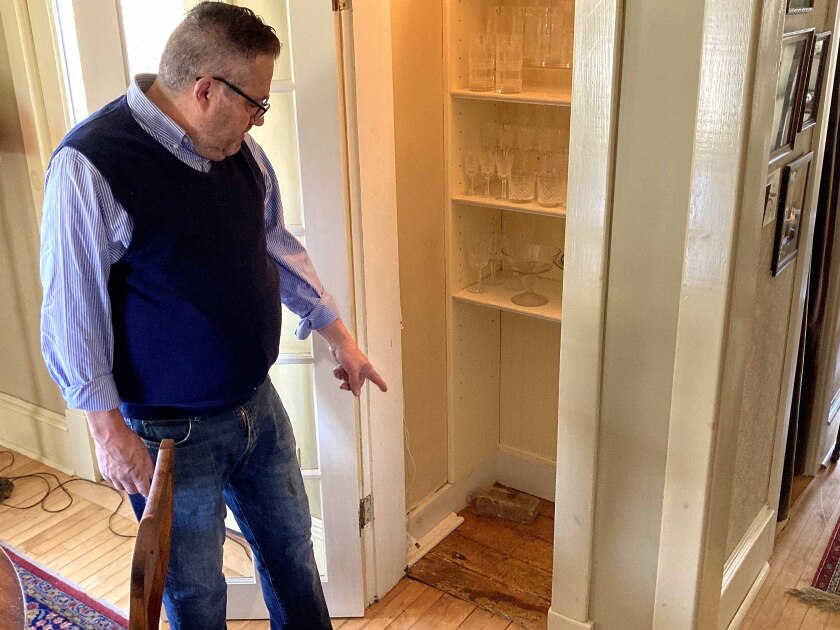 man pointing at the floor