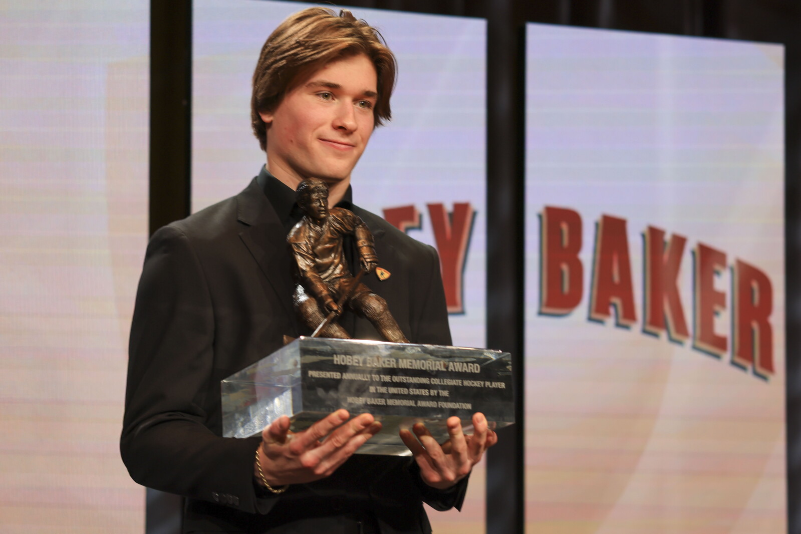 BU rookie Macklin Celebrini grabs Hobey Baker Award, but will he stay