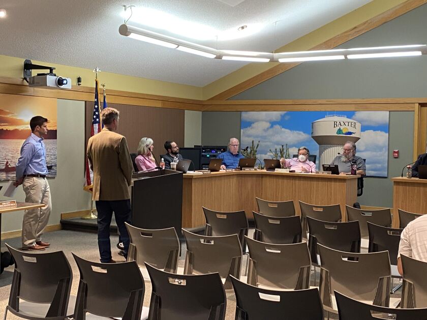 Two people present to the city council
