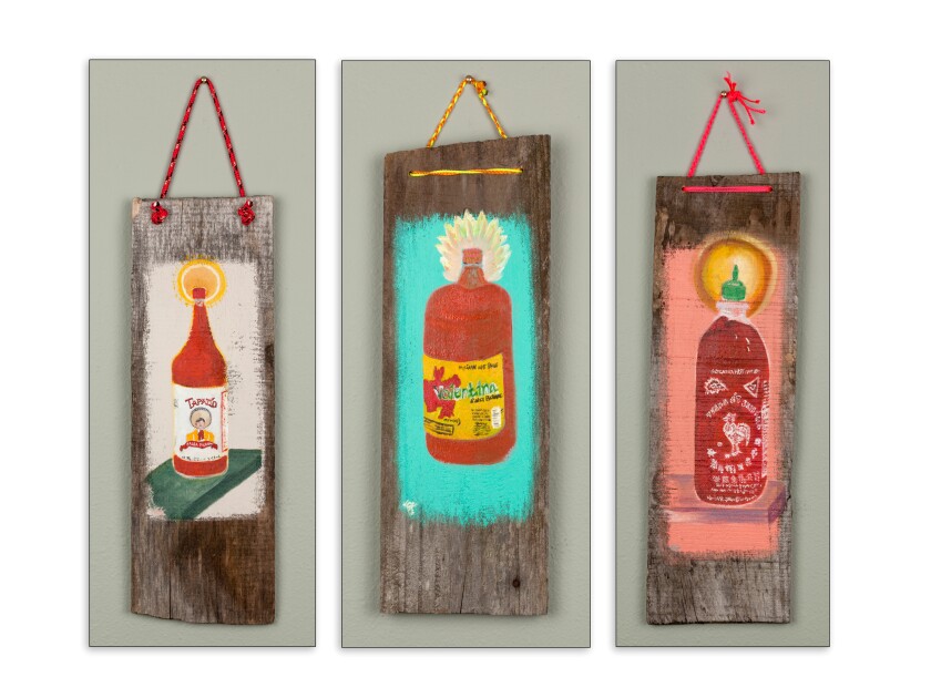 Pieces of wood with paintings on them.