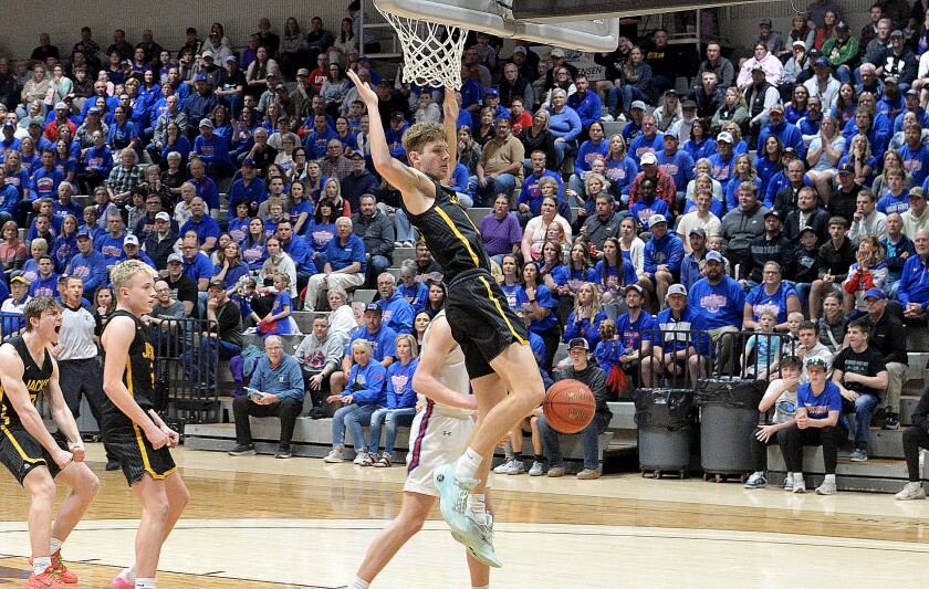 Dawson-Boyd senior Drew Hjelmeland comes down after a slam dunk in the Section 3A championship against Hills-Beaver Creek on Thursday, March 13, 2025 at the R/A Facility in Marshall.