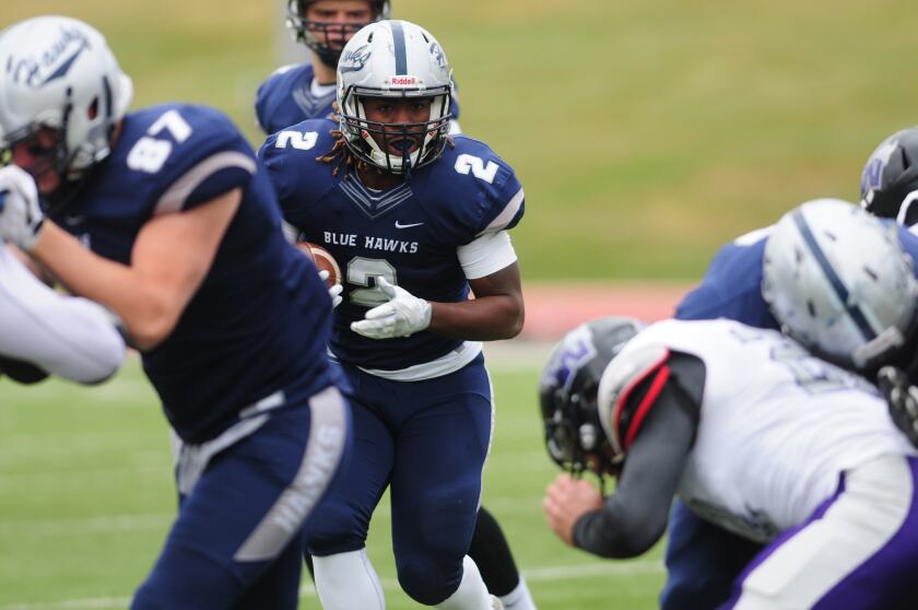 Dickinson State sophomore Karsten Mack Jr. runs up the field against Waldorf on Saturday, Oct. 14 at the Biesiot Activities Center. (Shelby Reardon / The Dickinson Press)