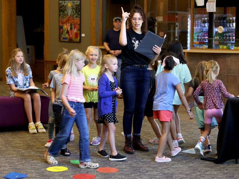 Ashiynn Lockhart, of the Dakota Players and the Black Hills Playhouse, works with young actors on a scene for the upcoming production of "Space School Musical," which begins at 7 p.m. Friday, August 19, 2022, at Memorial Auditorium Performing Arts Center. The residency is made possible by the Friends of the Auditorium and Worthington District 518 Community Education.