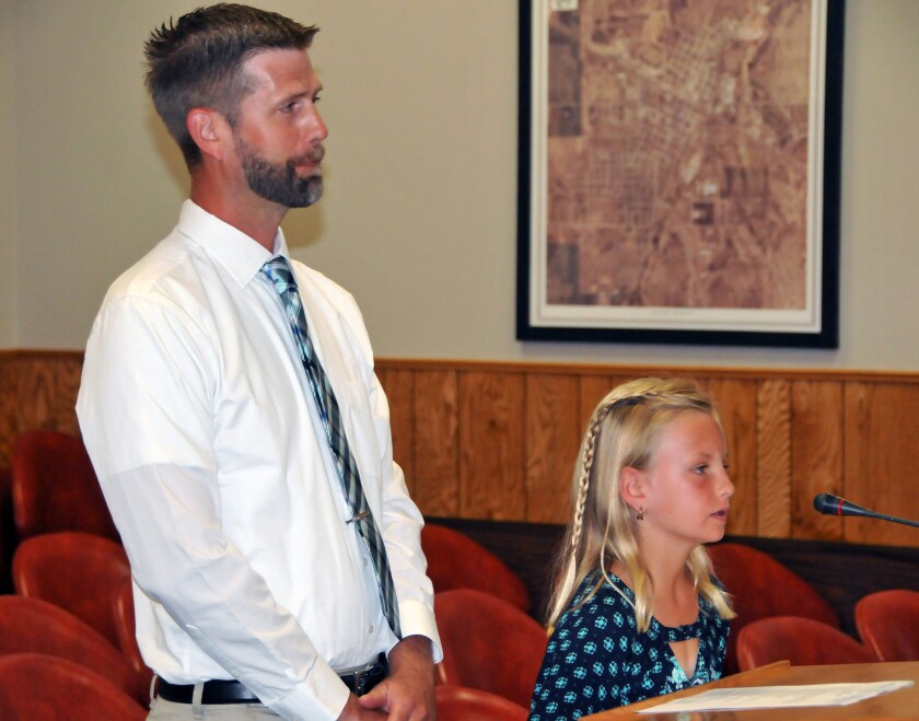 Lily Parker, a fourth-grade student at Wadena-Deer Creek Elementary, made her case to the Wadena City Council Tuesday evening for a poultry operation within the city limits. Lily was backed up by her father, Matt. Brian Hansel/Pioneer Journal