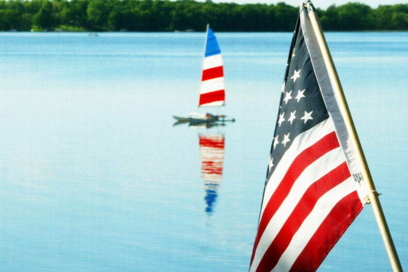 Flag and sailboat