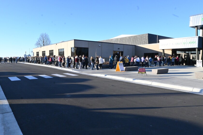Long line of people waiting to enter the 2022 Clara City Fall Arts and Craft Show.jpg