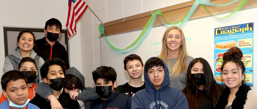 Kourney Leuthold, back right, Worthington Middle School EL teacher, hangs out with her 11 a.m. class, including Erwin Rog, Atlai Medrano, Oscar lima, Adams Martinez, Edwin Rocha, Uver Santizo, Reichel Garcia Jasmine Soto (left back up) Edgar Cruz Cruz, Tah So Collah and Miguel Marques.