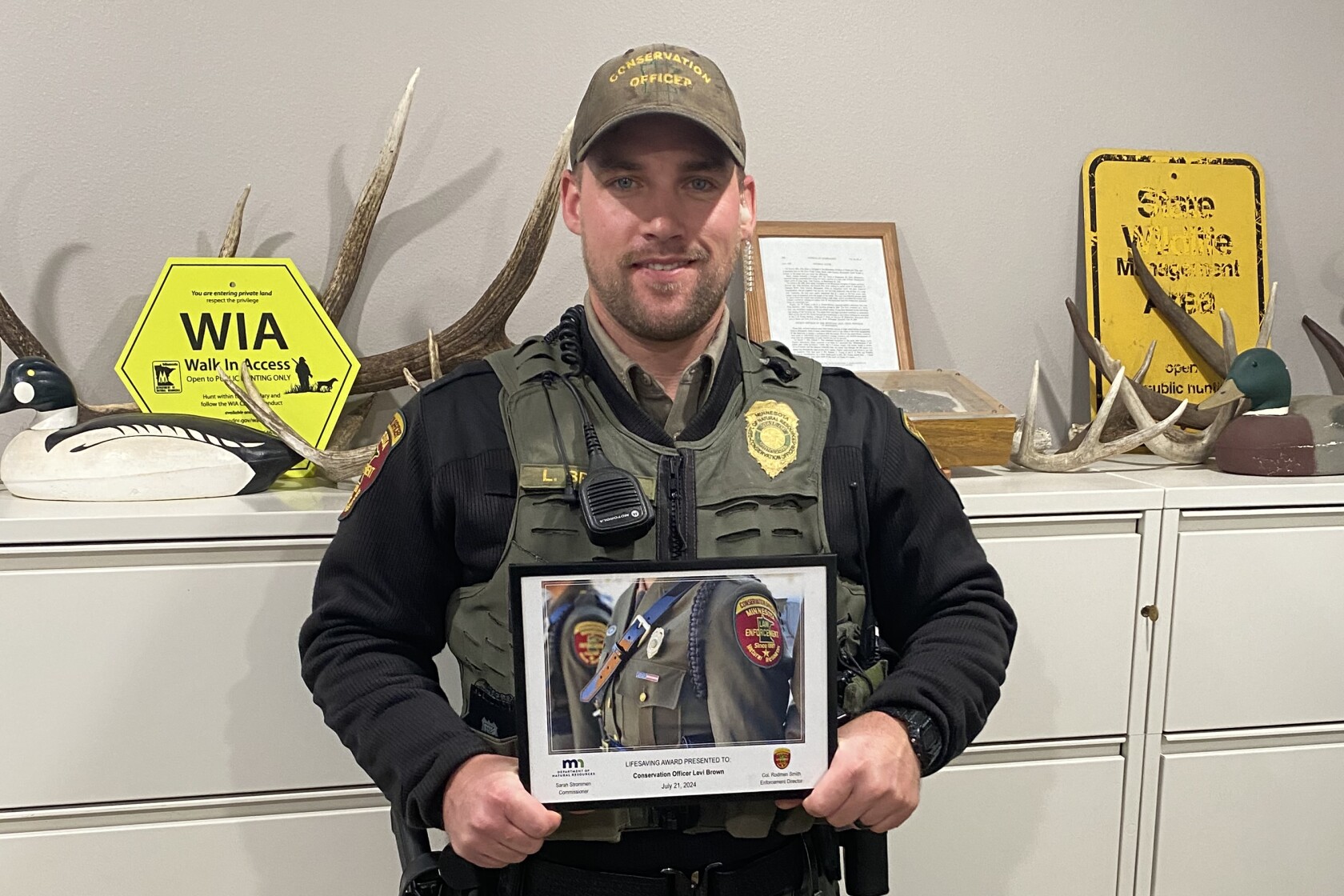 Minnesota DNR recognizes Benson conservation officer for lifesaving ...
