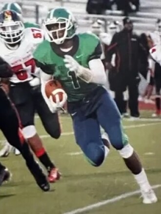 William Kwenkeu, now a linebacker for the Minnesota Vikings, carries the ball for St. Charles High School in an Oct. 2, 2015 game at North Point High School in Waldorf, Maryland.