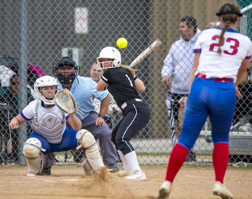 Litchfield junior Olivia Holmgren eyes an incoming pitch from Watertown-Mayer pitcher Abby Otterness during a game in Litchfield on Tuesday, May 17, 2022.