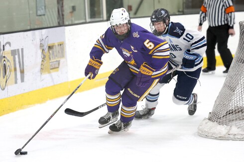 Player controls puck.
