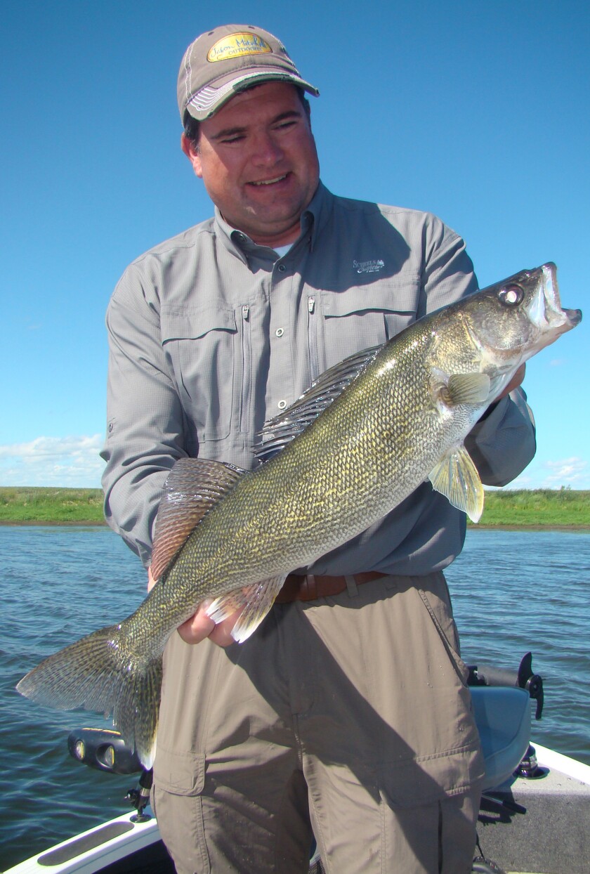 Jason Mitchell small lake walleye.jpg